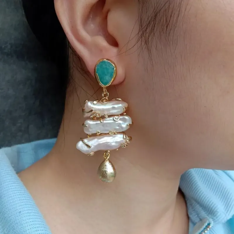 YYGEM statement earrings with evening attire