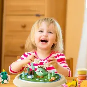 36 Color Air Dry Clay Kit - Brightly colored clay being shaped into various designs by a child