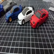A 10-set pack of alloy wheels & rubber tires for 1/64 diecast models, perfect for customization and smooth rolling.