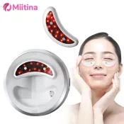 Woman enjoying LED Eye Massager Therapy treatment at home
